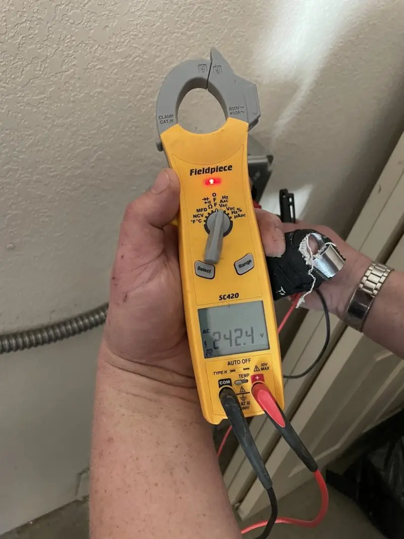 Voltage testing with clamp meter during Generator Installation in North Canton